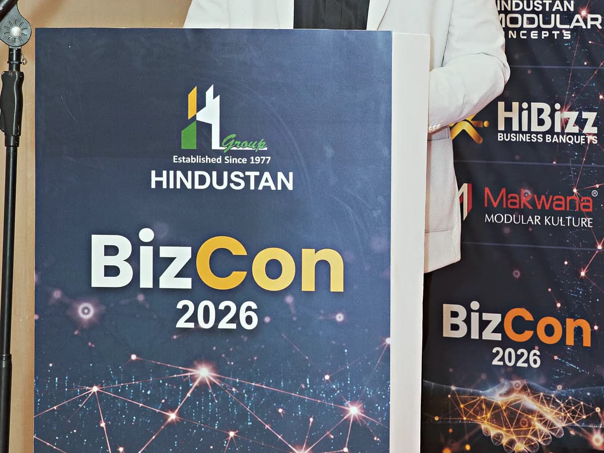 Branded podium on the red stage front at the HiBizz event hall in Goa