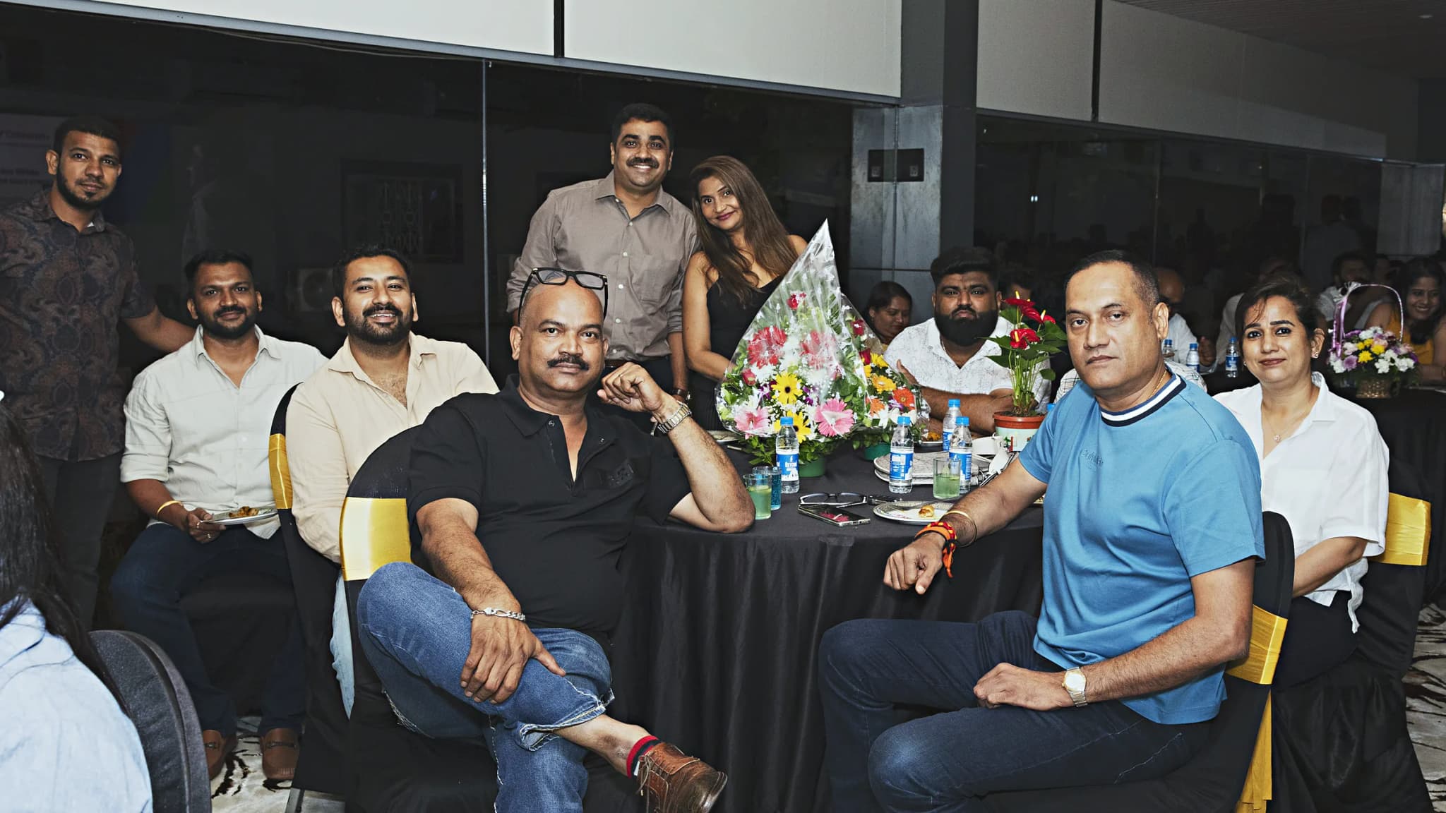 Business guests seated around banquet tables at a HiBizz networking evening in Goa